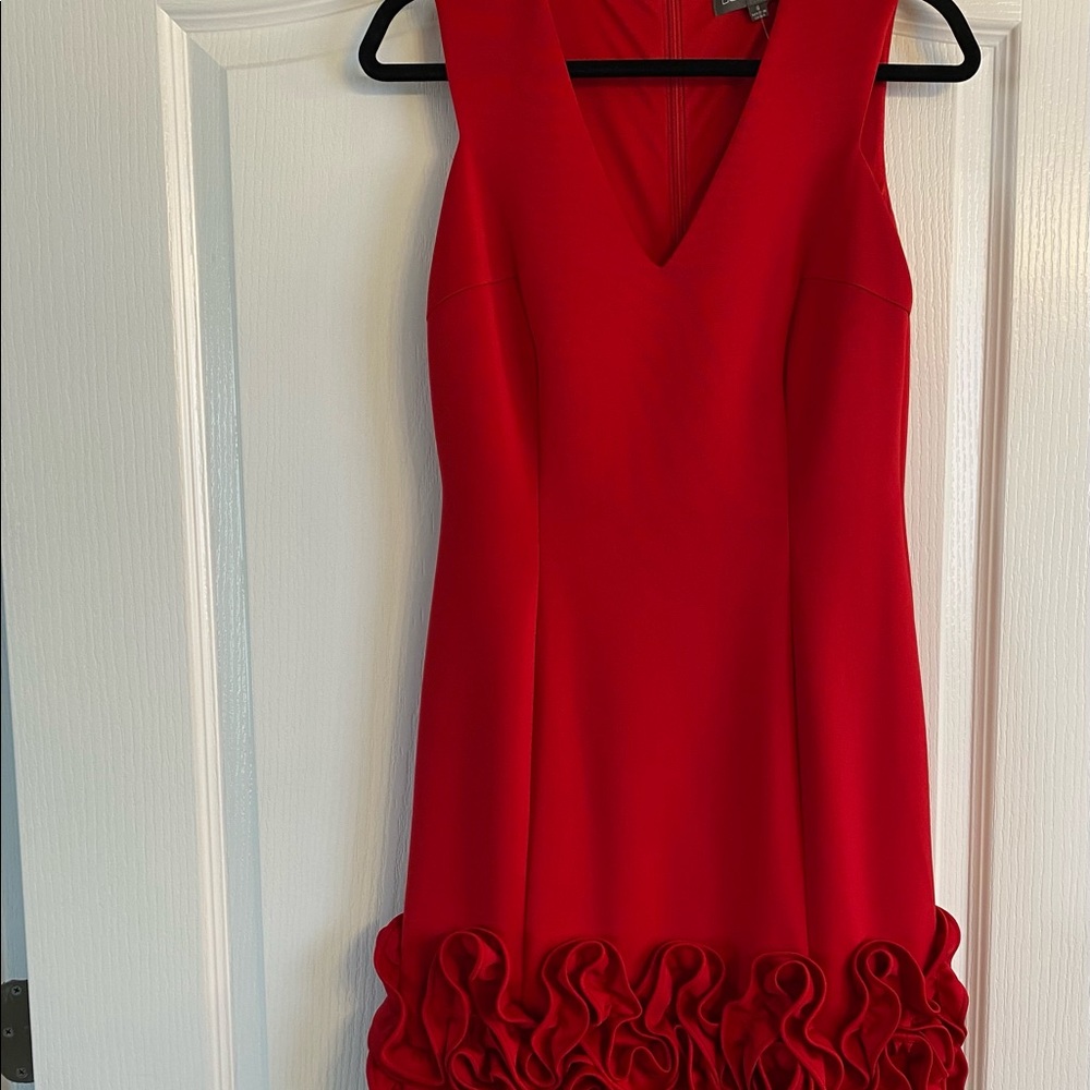 Red cocktail dress with rose detail on the hem